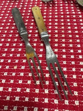 Antique 19th-century forks, likely from the Civil War era